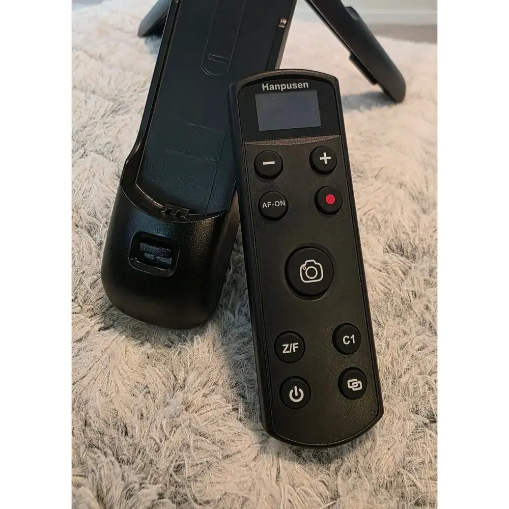 Hanpusen Wireless Remote Control Tripod Grip for Digital Cameras